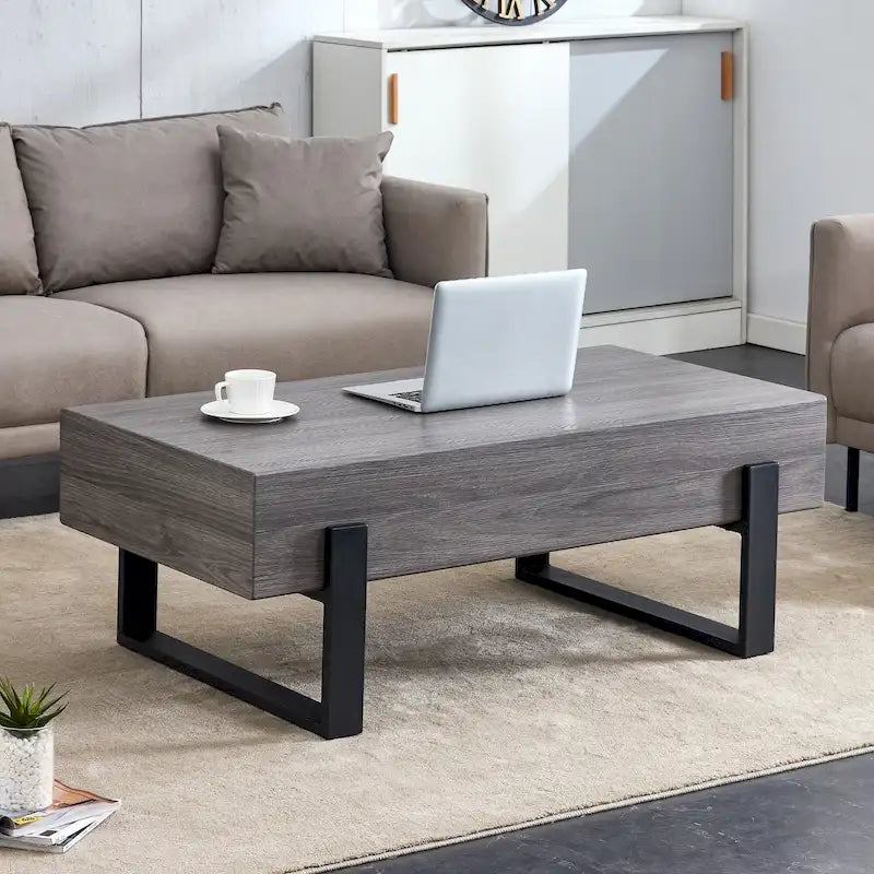 Une table basse en MDF de couleur gris rustique avec des pieds en métal noir – Un espace élégant aux tons de bois naturel
